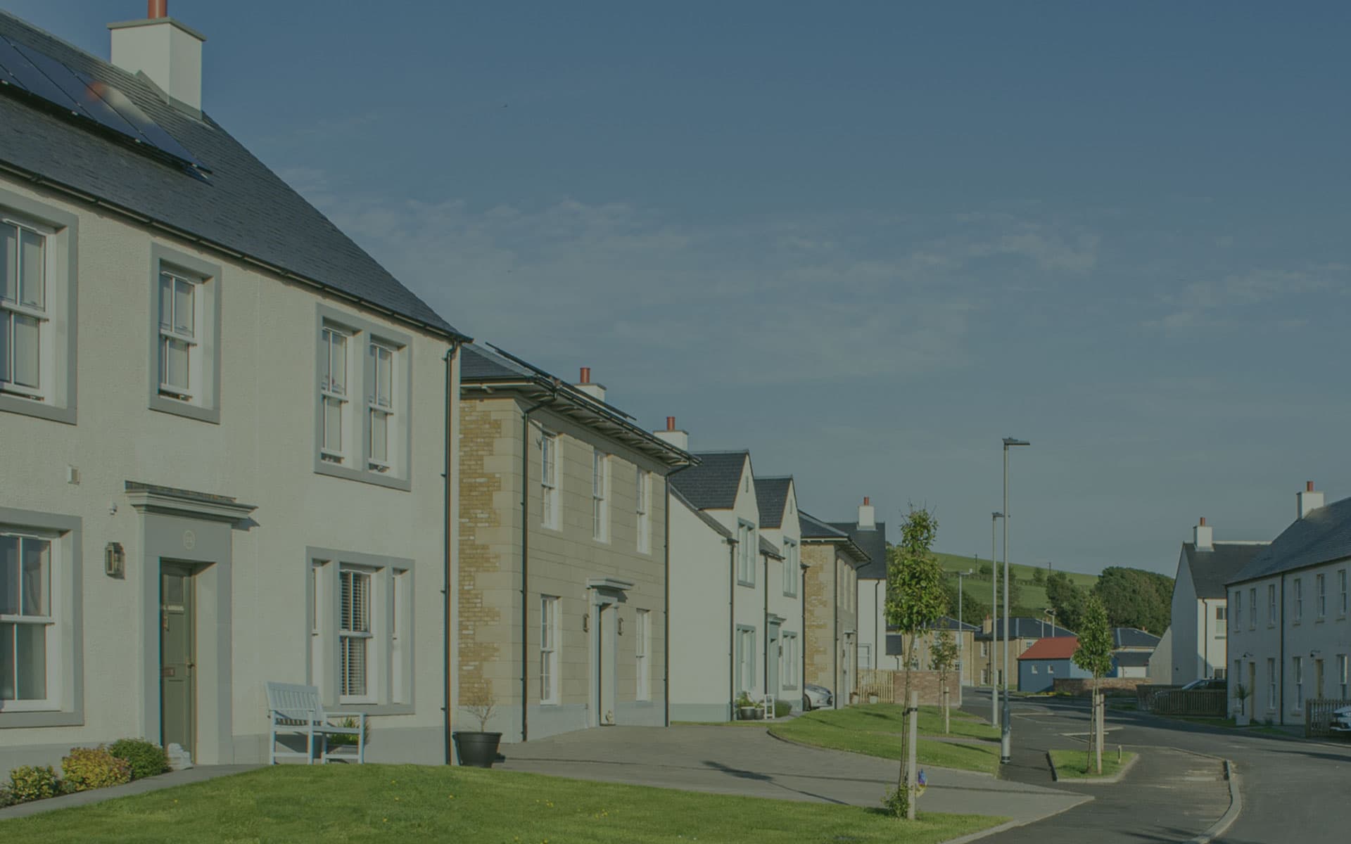 White uPVC sliding sash window with Georgian bars on brick