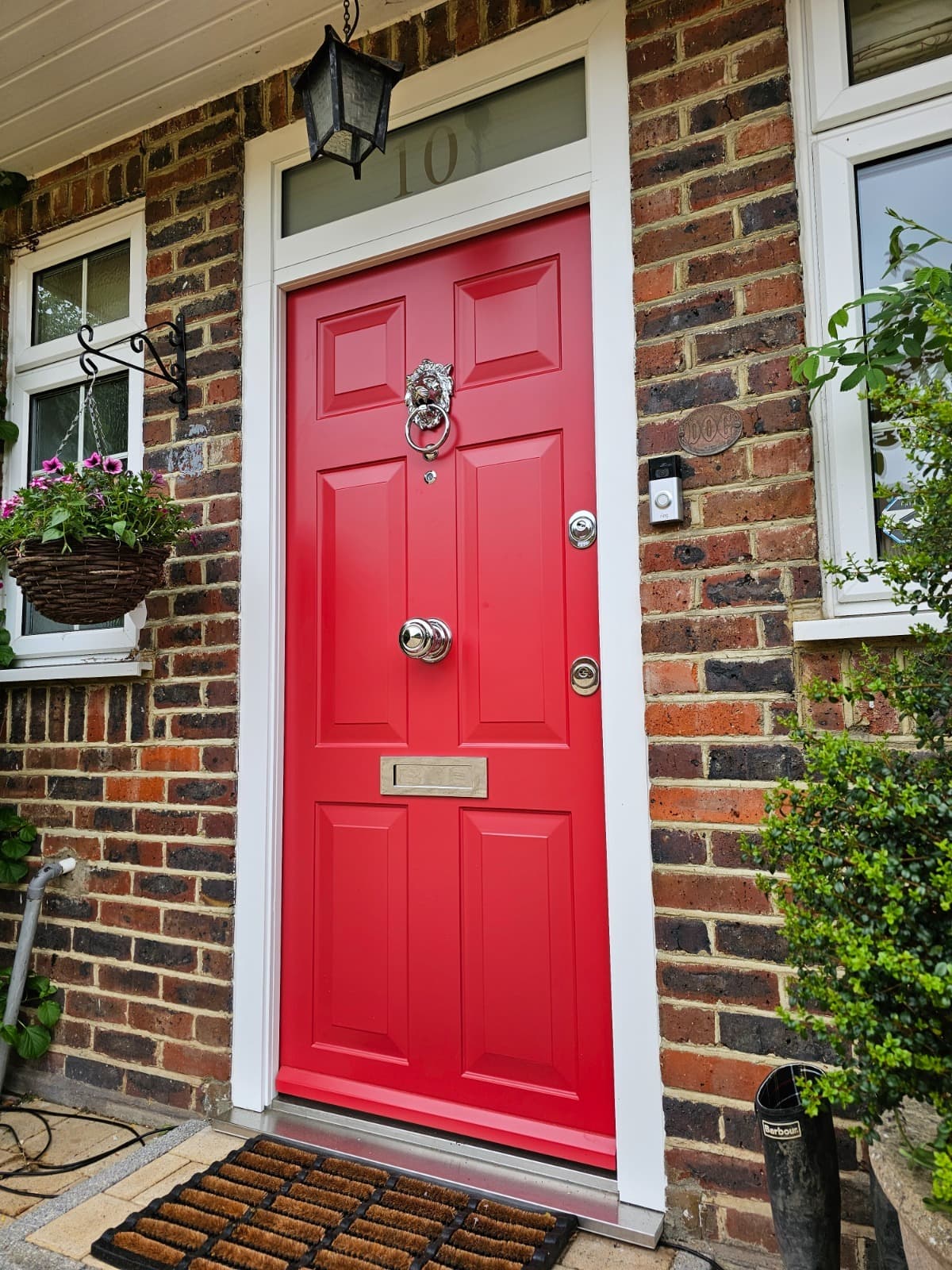 Red steel door on cottage