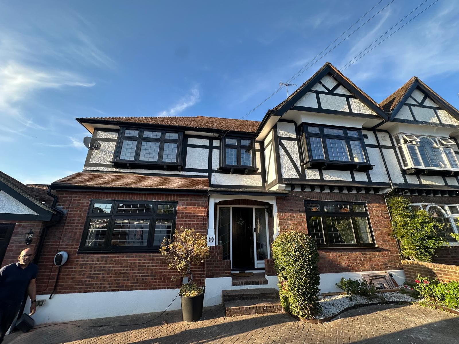 Tudor style home with complete anthracite aluminium glazing