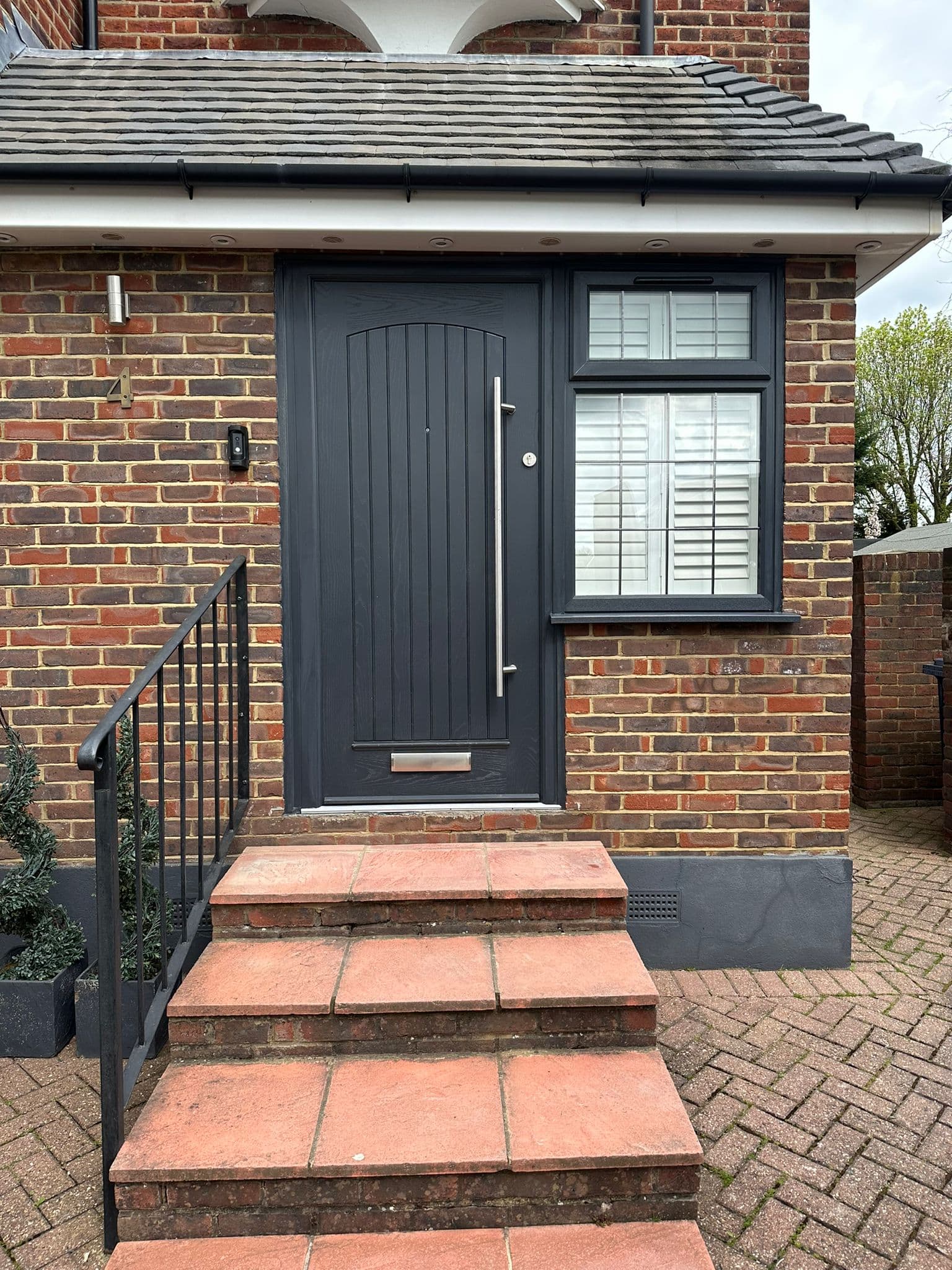 Anthracite composite entrance door with porch
