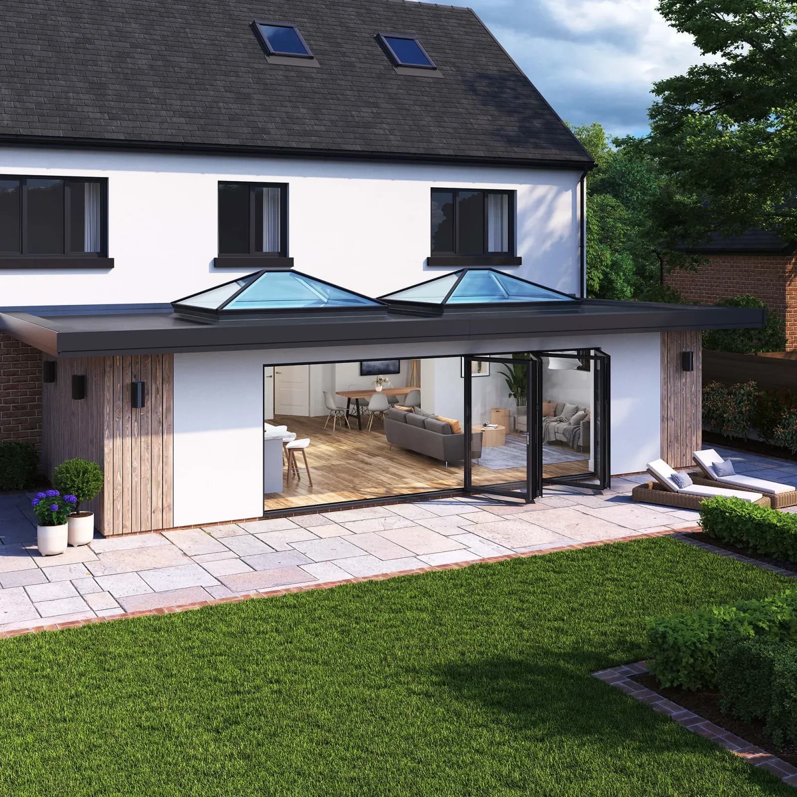 Contemporary home with aluminium bifold doors at dusk