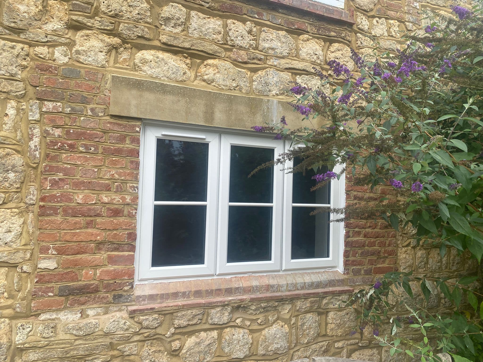 uPVC casement windows on stone cottage