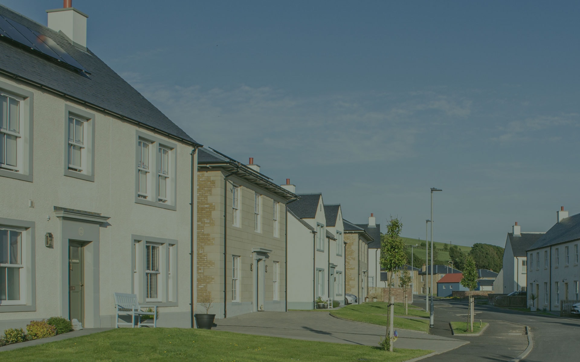 White uPVC sliding sash window with Georgian bars on brick